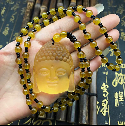 Yellow carved stone - yellow, buddha