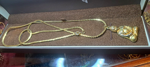 Gold tone religious buddha - tone,